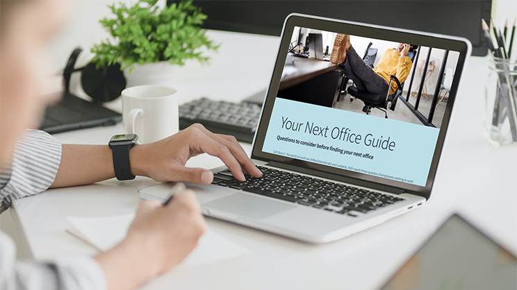 Your Next Office Guide from JLL on a laptop screen