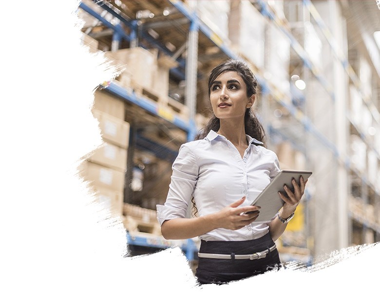 A woman working in a warehouse