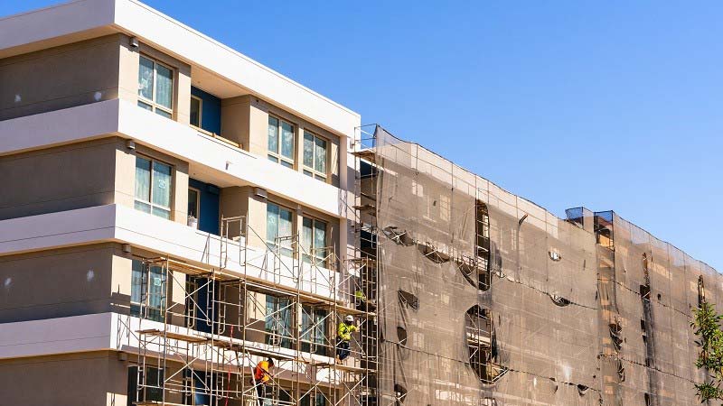 A multifamily residential building in construction