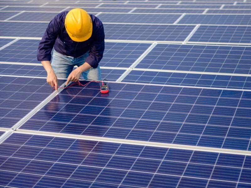 Guy working on renewable energy