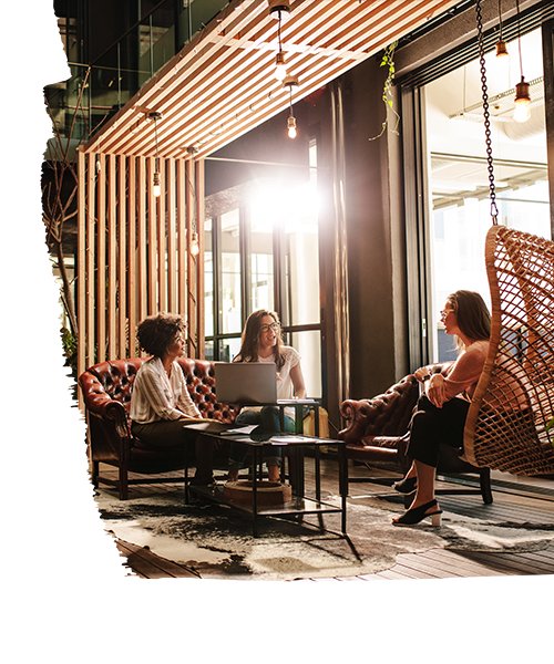 Women discussing work and their ideas in the office lounge