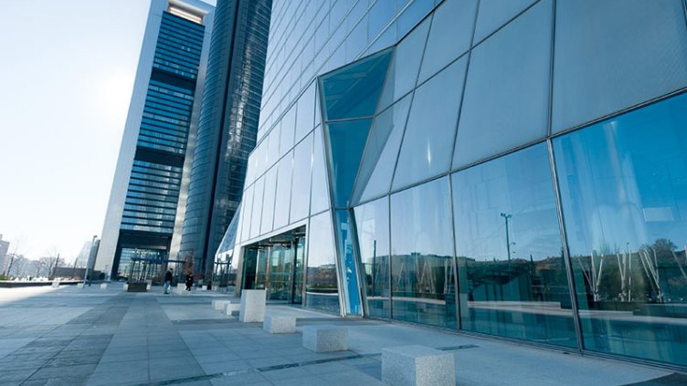 Entrance view of modern high rise office building workplace